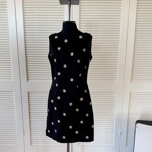 Chic Black Dress with White Floral Accents by Amanda Smith